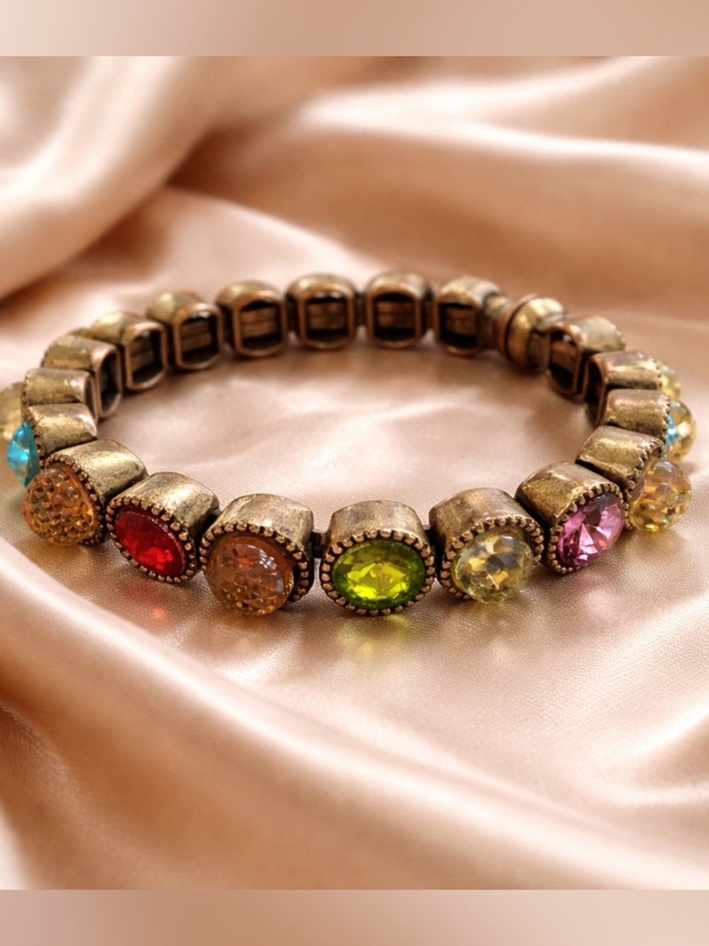 Vintage gold tone bracelet with multi coloured stones
